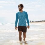 Surfers, Swimmers, Sun Seekers: This Men's Rash Guard is Your Ocean Ally (Image of a group of friends at the beach wearing the rash guard)