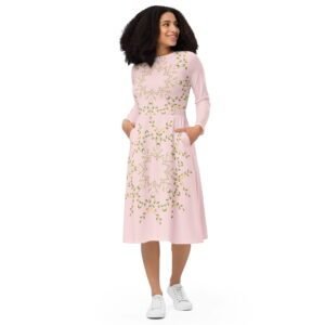 A model confidently twirling in a beautiful Teeslo midi dress.